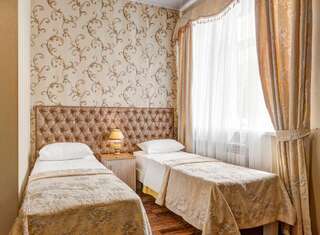 Гостиница  Наири Волгоград Стандартный двухместный номер с 2 отдельными кроватями-1